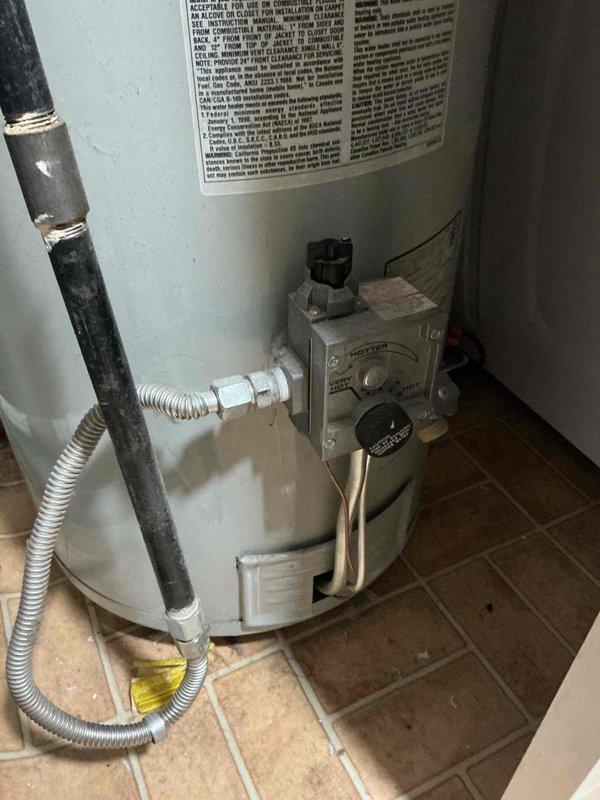 Completed plumbing estimate for tankless water heater replacement in garage apartment utility room. Assessed existing State brand gas-fired tank water heater with standard copper supply lines, gas control valve assembly, and flexible connector configuration. Provided comprehensive evaluation and pricing options for tankless water heater conversion, including necessary modifications to gas line sizing, venting requirements, and electrical supply considerations for the proposed installation.