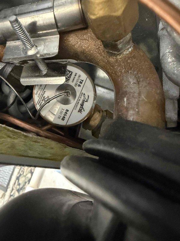 Newburgh, IN - Completed second annual maintenance visit on dual HVAC system consisting of newer platinum-level unit and older gold-level unit. Performed comprehensive planned maintenance inspection, collected filter size measurements for future service, documented system conditions with photos showing plumbing connections, pressure controls, and mechanical components in operational status, and processed membership renewal for continued dual-system coverage.