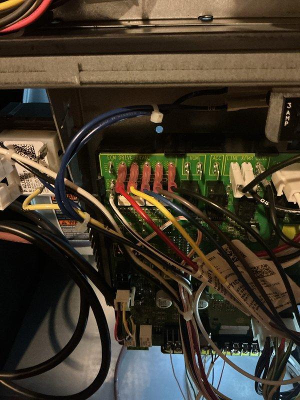 Completed first scheduled quarterly maintenance visit on HVAC system. Performed comprehensive inspection of air handler control systems, including ECM drive circuit board and associated wiring connections. Documented condition of control board terminals, wire connections, and electronic components. Verified proper operation of integrated circuits, capacitors, and resistors on main PCB. Inspected terminal blocks, wire bundling, and connection integrity throughout control panel enclosure. Installed 16x25x5 air filter as part of routine maintenance protocol. All system components found operating within normal parameters with wiring properly secured and organized.
