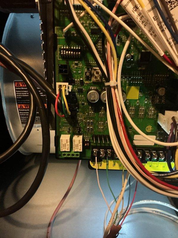 Completed first scheduled quarterly maintenance visit on HVAC system. Performed comprehensive inspection of air handler control systems, including ECM drive circuit board and associated wiring connections. Documented condition of control board terminals, wire connections, and electronic components. Verified proper operation of integrated circuits, capacitors, and resistors on main PCB. Inspected terminal blocks, wire bundling, and connection integrity throughout control panel enclosure. Installed 16x25x5 air filter as part of routine maintenance protocol. All system components found operating within normal parameters with wiring properly secured and organized.