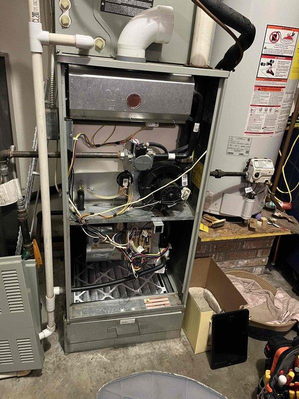 Evansville, IN - Performed routine maintenance on AC system of undetermined age. Inspected interior components including fan assembly, control board, electrical connections, and PVC drainage pipes. System is operating properly with no issues identified during the preventative maintenance service.