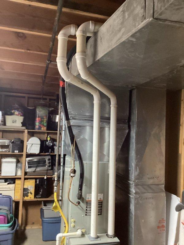 Completed site assessment for gas tankless water heater conversion from existing 40-gallon gas tank unit. Evaluated current HVAC setup, including ventilation requirements, gas line specifications, and available installation space in basement utility area. Prepared comprehensive estimate for removal of existing unit and installation of new tankless system with appropriate venting modifications.