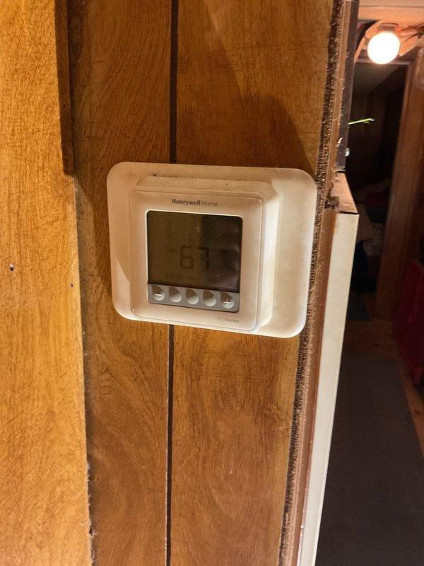 Evansville, IN - Completed scheduled Platinum Level maintenance service on one HVAC system. Inspected and verified proper operation of Honeywell Home digital thermostat (currently reading 67°F) installed on wooden wall. Replaced 20x20x5 filter as part of annual maintenance plan (first visit of the year).