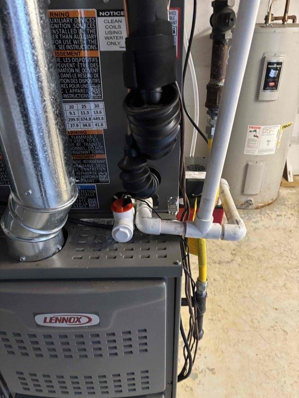 Completed follow-up service call to address failed inspection items. Installed required Safety T-Switch and PVC cap on condensation line to bring system into compliance with inspection requirements. System should now meet all inspection criteria for property closing.