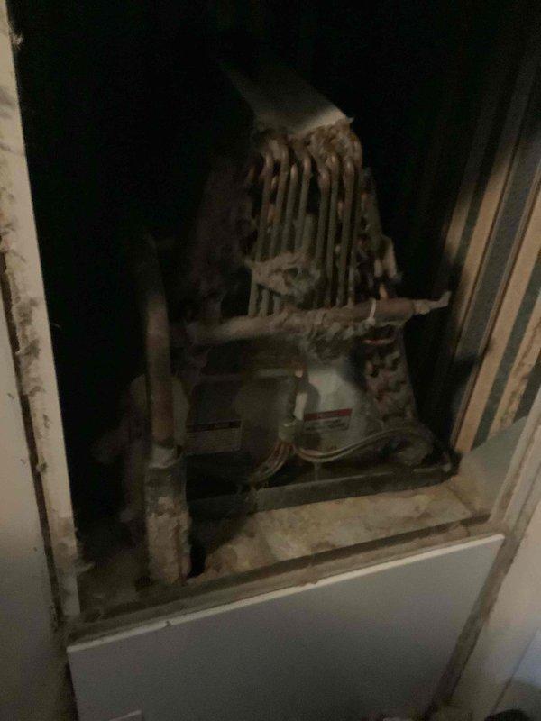 # HVAC Replacement Estimate Report

Completed comprehensive replacement estimate for residential HVAC system at customer's request. Homeowner present during evaluation as required for replacement consultation. Customer indicated current system is non-operational and specifically requested replacement options only, declining repair assessment.

Conducted thorough inspection of existing outdoor air conditioning condenser unit and indoor air handler components. Exterior condenser unit exhibits significant age-related deterioration with visible weathering, dirt accumulation on protective grilles, and general wear consistent with end-of-service-life equipment. Unit positioned on concrete pad adjacent to structure with standard electrical conduit connections. Interior inspection revealed aging heat exchanger coil assembly with visible discoloration, dust buildup, and signs of extended operational wear. Examined control board, wiring connections, and drip pan assembly within cabinet compartme