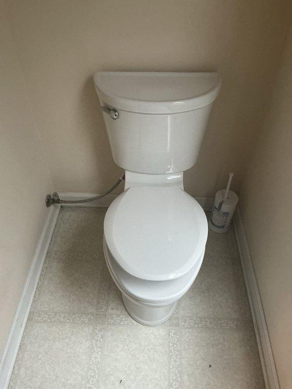 Completed installation of two white two-piece porcelain toilets as part of a promotional replacement project. Both fixtures were properly installed with chrome flush levers, flexible water supply lines connected and tested for leaks, and all mounting hardware secured to manufacturer specifications. Verified proper operation, flushing performance, and water flow on both units before completing the job.