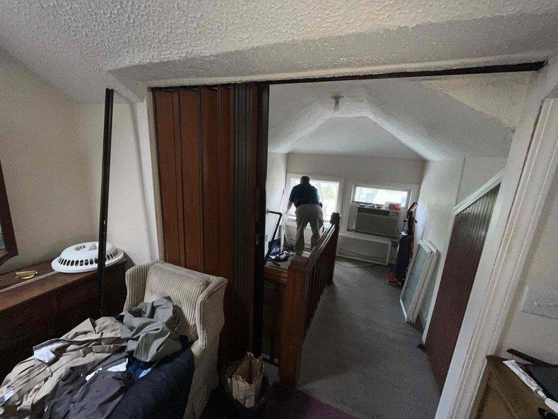 Conducted comprehensive replacement estimate for residential property currently without central HVAC system, relying only on window unit for upstairs cooling. Evaluated site conditions and took detailed measurements of installation areas including window openings and upstairs living spaces to assess feasibility for ductless mini-split system installation and heat pump replacement. Documented existing conditions through photographic survey of upper-level rooms, access points, and potential equipment locations to develop accurate equipment sizing and installation proposal for complete HVAC system replacement.