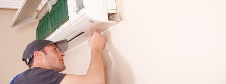 Wall-mounted ductless mini-split HVAC unit in a living room