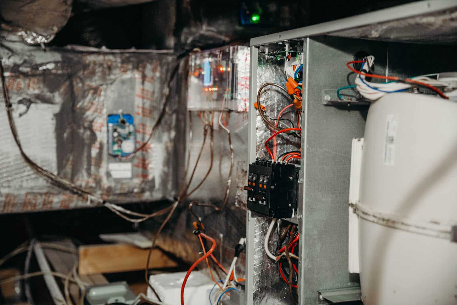 Furnace unit installed in a compact attic space