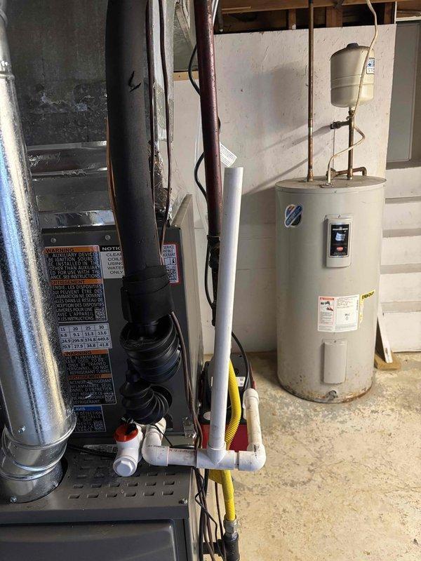 Completed follow-up service call to address failed inspection items. Installed required Safety T-Switch and PVC cap on condensation line to bring system into compliance with inspection requirements. System should now meet all inspection criteria for property closing.