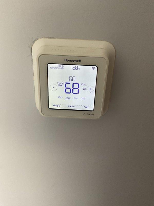 Bardstown, KY - Diagnosed 5-year-old heating system with no heat issue where fan was operating but only delivering room temperature air. Performed system inspection, reset breaker, and verified thermostat functionality (Honeywell Pro Series set to 68°F in Heat mode). Restored proper heating operation through component testing and necessary adjustments.