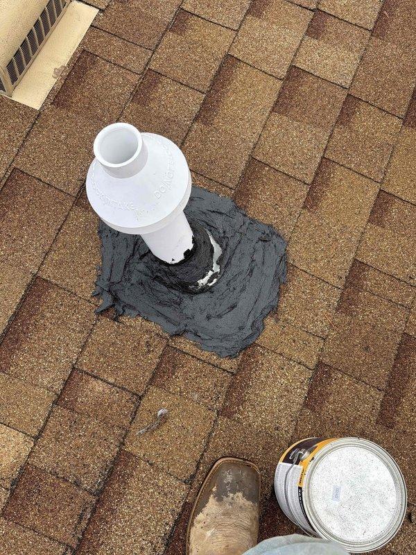 Installed furnace concentric kit requiring roof access to modify existing exhaust venting system. Properly sealed PVC pipe penetration with roofing cement to ensure weatherproof installation. Part has been ordered to complete the repair; system currently operational with green priority status.