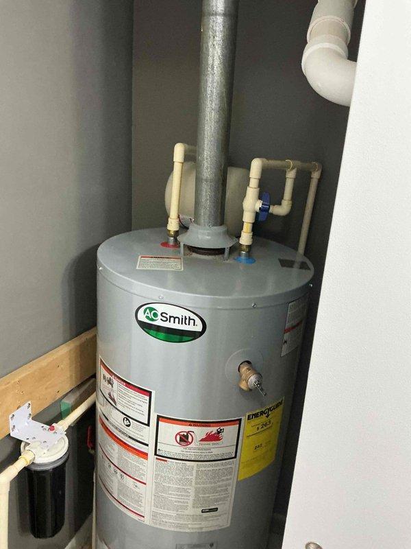 Inspected A.O. Smith water heater system and identified need for shut-off valve replacement and filter installation. Documented existing filtration system and provided customer with quote for water softener as requested. Parts have been ordered with customer preferring installation during warmer weather; scheduled follow-up to install polarized filter and perform duct cleaning during next AC maintenance visit.