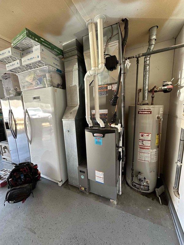 Successfully installed a complete 3-ton HVAC system, including indoor furnace unit with PVC exhaust and outdoor condensing unit. System was properly connected to existing ductwork, with all electrical components wired according to manufacturer specifications and local code requirements.