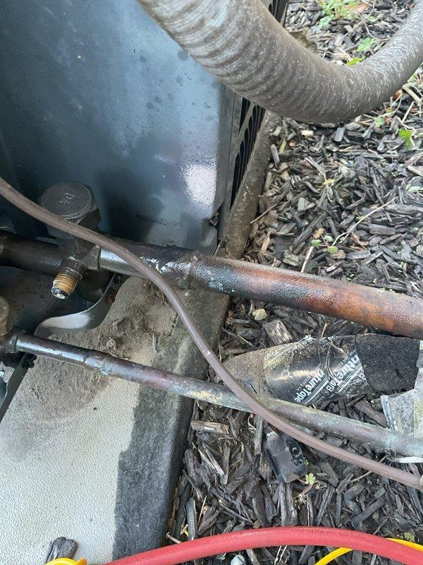 # Service Report

Responded to no-cool call on 15-year-old residential HVAC system with reported minimal airflow and outdoor unit failure to operate. Upon arrival, performed comprehensive system diagnostic including electrical testing, refrigerant pressure analysis, and airflow assessment. Identified failed compressor contactor preventing outdoor condenser unit from engaging. Replaced defective contactor and verified proper electrical connections throughout system. Inspected condenser coils showing moderate debris accumulation and weathering consistent with system age; cleaned coils to restore optimal heat transfer efficiency. Tested system operation through complete cooling cycle, confirming outdoor unit engagement, proper compressor function, and restored airflow at supply registers. System operating within manufacturer specifications at time of departure. Advised customer of system age and recommended monitoring for future component wear given visible corrosion on refrigerant lines 