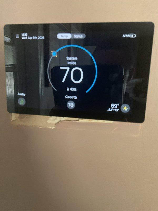 Completed annual Platinum Level maintenance on a 7-month-old single HVAC system. Performed comprehensive inspection of all system components, verified thermostat operation showing proper cooling mode function at 70°F setpoint with 43% humidity level, and confirmed system controls responding appropriately. Inspected equipment in garage location, changed CFI filter, tested system performance parameters, and documented all findings with photographic records for maintenance history.
