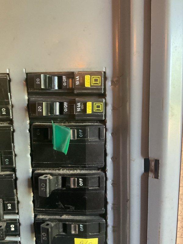 Evaluated residential electrical infrastructure to determine capacity and requirements for proposed ductless mini-split installation in bedroom area. Assessed existing electrical panel, circuit breaker configuration, and available amperage to support additional HVAC load. Photographed panel layout showing current circuit distribution, breaker ratings, and available spaces for dedicated mini-split circuit installation to provide independent cooling zone as requested.