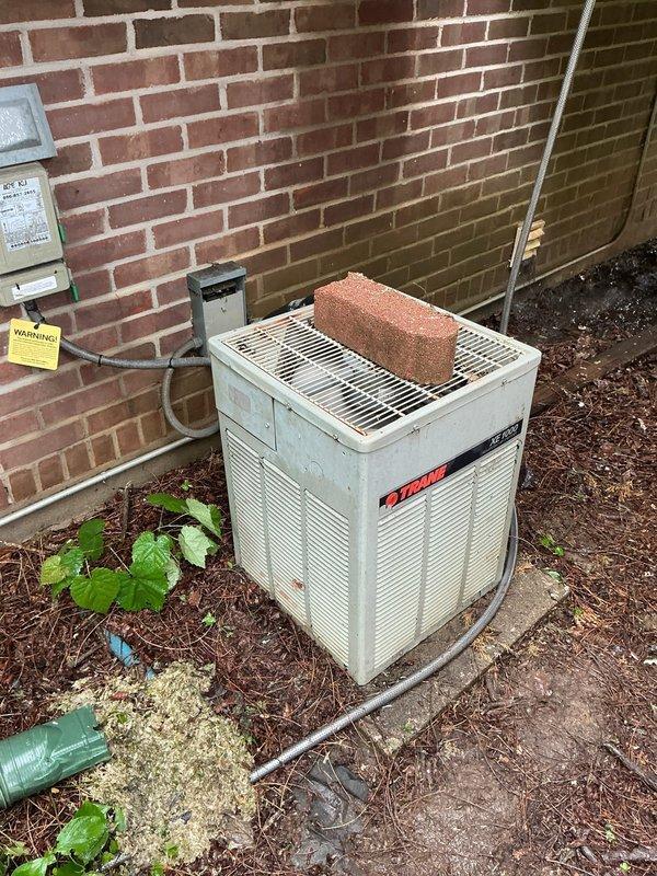 Responded to service call for Trane air conditioning system failing to cool adequately, with indoor temperature at 80°F despite thermostat set to 70°F. Customer reported compressor making humming sound with condenser fan not operating. Upon arrival, performed diagnostic evaluation of outdoor condensing unit. Confirmed compressor attempting to start but condenser fan motor not engaging. Verified electrical supply at disconnect, confirmed no tripped breakers, and tested capacitor under load. Found dual run capacitor failed, preventing fan motor from starting while causing compressor to labor. Replaced defective capacitor with appropriate microfarad-rated component. Verified proper fan motor operation and confirmed compressor running normally without excessive amp draw. System cycled properly with adequate airflow through condenser coil. Monitored unit through complete cooling cycle to ensure proper operation and temperature differential.