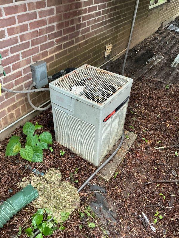 Responded to service call for Trane air conditioning system failing to cool adequately, with indoor temperature at 80°F despite thermostat set to 70°F. Customer reported compressor making humming sound with condenser fan not operating. Upon arrival, performed diagnostic evaluation of outdoor condensing unit. Confirmed compressor attempting to start but condenser fan motor not engaging. Verified electrical supply at disconnect, confirmed no tripped breakers, and tested capacitor under load. Found dual run capacitor failed, preventing fan motor from starting while causing compressor to labor. Replaced defective capacitor with appropriate microfarad-rated component. Verified proper fan motor operation and confirmed compressor running normally without excessive amp draw. System cycled properly with adequate airflow through condenser coil. Monitored unit through complete cooling cycle to ensure proper operation and temperature differential.