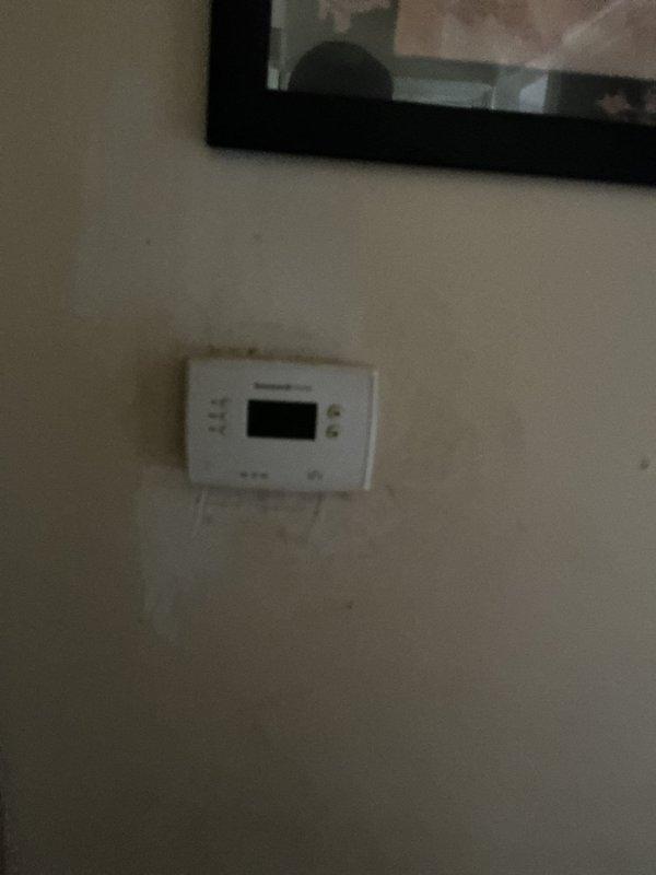 Conducted comprehensive HVAC replacement estimate for a 21-year-old non-operational system. Assessed existing equipment located in basement utility area, evaluated current ductwork configuration and thermostat setup, and documented system conditions through photographic documentation. Provided homeowner with replacement options and recommendations based on equipment age and system failure.
