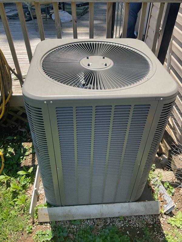 Completed comprehensive air conditioning tune-up and preventive maintenance on 5-year-old residential cooling system as part of annual maintenance plan. Performed thorough inspection of outdoor condenser unit, verified proper amperage draw at 17.24 amps using clamp meter, checked electrical connections, and assessed overall system operation. Unit found in good working condition with no deficiencies noted; all components operating within manufacturer specifications.
