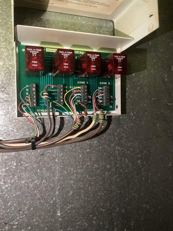 Conducted comprehensive HVAC system replacement estimate for residential property. Evaluated existing multi-zone heating and cooling system including Trol-A-Temp zone control panel with five-zone capability, assessed current equipment configuration and installation space constraints in mechanical area. Documented existing system components, zoning controls, and equipment placement to provide accurate replacement recommendations and ensure proper sizing for new system installation.