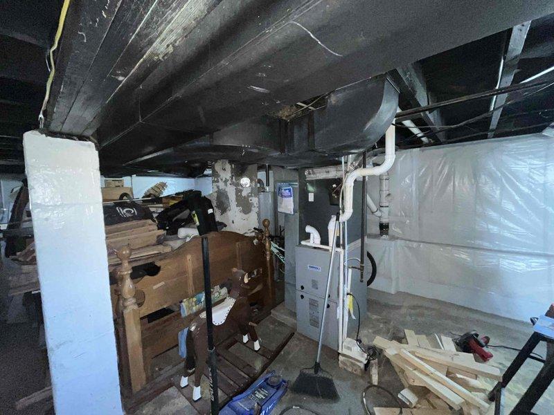 Conducted on-site assessment for HVAC system relocation within basement area to accommodate remodeling and finishing project. Evaluated existing furnace, ductwork configuration, and mechanical equipment placement in current central basement location. Documented clearance measurements, ductwork routing, and structural considerations for relocating system to alternate basement area. Photographed existing installation including plenum connections, rectangular trunk lines, PVC condensate piping, and equipment positioning to develop comprehensive relocation estimate accounting for new duct runs, electrical modifications, and proper clearances in proposed location.