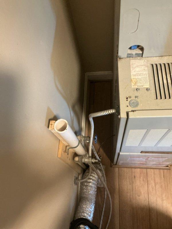 Conducted comprehensive assessment of existing HVAC system for replacement estimate. Documented current equipment configuration including ductwork connections, air handling components, and window-mounted AC unit with associated condensate drainage system. Evaluated installation conditions and provided detailed photographic documentation to support Green A+ replacement proposal.