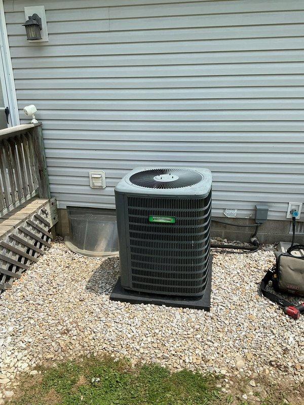 Evansville, IN - Completed Platinum Level maintenance on a single-zone HVAC system during first scheduled visit for 6-year-old unit. Serviced washable filter, inspected outdoor condensing unit positioned on gravel pad, and verified proper operation of all system components with green indicator light displaying normal status.