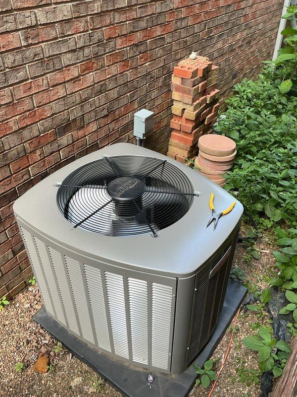 Completed second annual Platinum Level maintenance on 3-year-old HVAC system consisting of outdoor condenser unit and indoor air handler. Performed comprehensive inspection of condenser unit located in exterior side yard between brick structures, verifying proper operation of fan motor, compressor, and electrical components. Checked refrigerant pressures and temperatures to ensure system is operating within manufacturer specifications. Cleaned condenser coils and removed debris from unit exterior and surrounding area. Inspected electrical connections, contactors, and capacitors for signs of wear or deterioration. Verified proper operation of disconnect box and conduit connections. 

Replaced 20x25x5 air filter at indoor air handler location. Inspected blower motor assembly, evaporator coil, and drain pan for proper operation and cleanliness. Cleared condensate drain line to ensure proper drainage and prevent future blockages. Checked thermostat operation and calibration. Tested system 