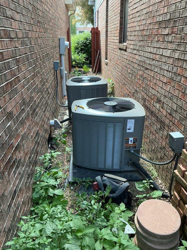 Completed second annual Platinum Level maintenance on 3-year-old HVAC system consisting of outdoor condenser unit and indoor air handler. Performed comprehensive inspection of condenser unit located in exterior side yard between brick structures, verifying proper operation of fan motor, compressor, and electrical components. Checked refrigerant pressures and temperatures to ensure system is operating within manufacturer specifications. Cleaned condenser coils and removed debris from unit exterior and surrounding area. Inspected electrical connections, contactors, and capacitors for signs of wear or deterioration. Verified proper operation of disconnect box and conduit connections. 

Replaced 20x25x5 air filter at indoor air handler location. Inspected blower motor assembly, evaporator coil, and drain pan for proper operation and cleanliness. Cleared condensate drain line to ensure proper drainage and prevent future blockages. Checked thermostat operation and calibration. Tested system 