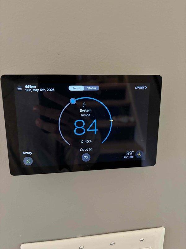 Responded to callback for cooling system malfunction following planned maintenance. Found interlock safety switch open, preventing system operation and causing indoor temperature to rise to 86°F with thermostat displaying error message. Inspected furnace safety controls, reset interlock switch, verified proper closure of access panels, and tested system operation. Confirmed cooling system restored to normal function with thermostat communicating properly and unit cycling correctly to reach setpoint of 72°F.