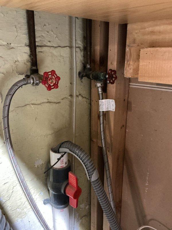 Performed comprehensive USA Bronze tanked water heater maintenance flush service. Drained sediment buildup from tank bottom through drain valve, inspected inlet/outlet connections with flexible stainless steel supply lines, verified proper operation of temperature and pressure relief valve, and confirmed all gate valves and shutoff mechanisms were functioning correctly. System was refilled, inspected for leaks, and returned to normal operation with all components operating within manufacturer specifications.